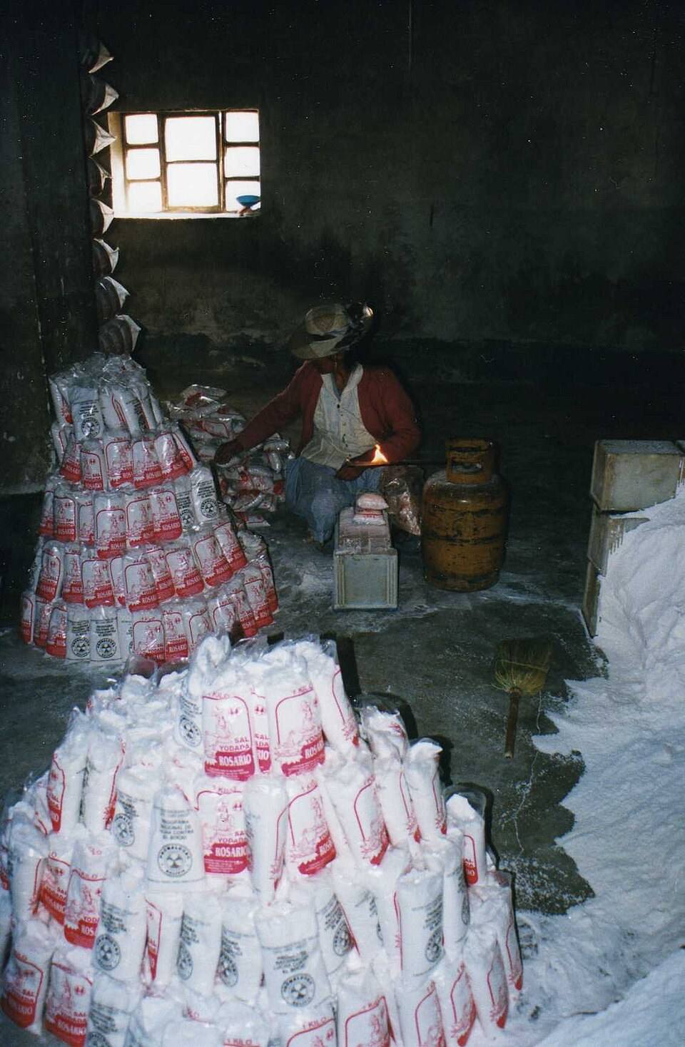 Sealing salt bags in Colchani, a historical 1999 photograph.